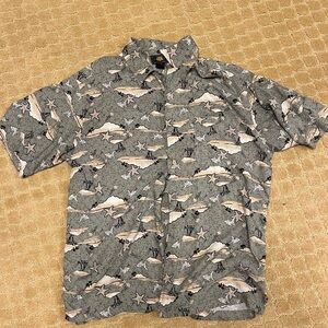 Beach shirt with trees and island and starfish, Size M but fits big,Mainly green